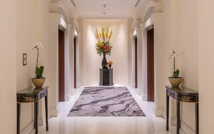 Elevators vestibule with flower bouquets at InterContinental Hotel Singapore